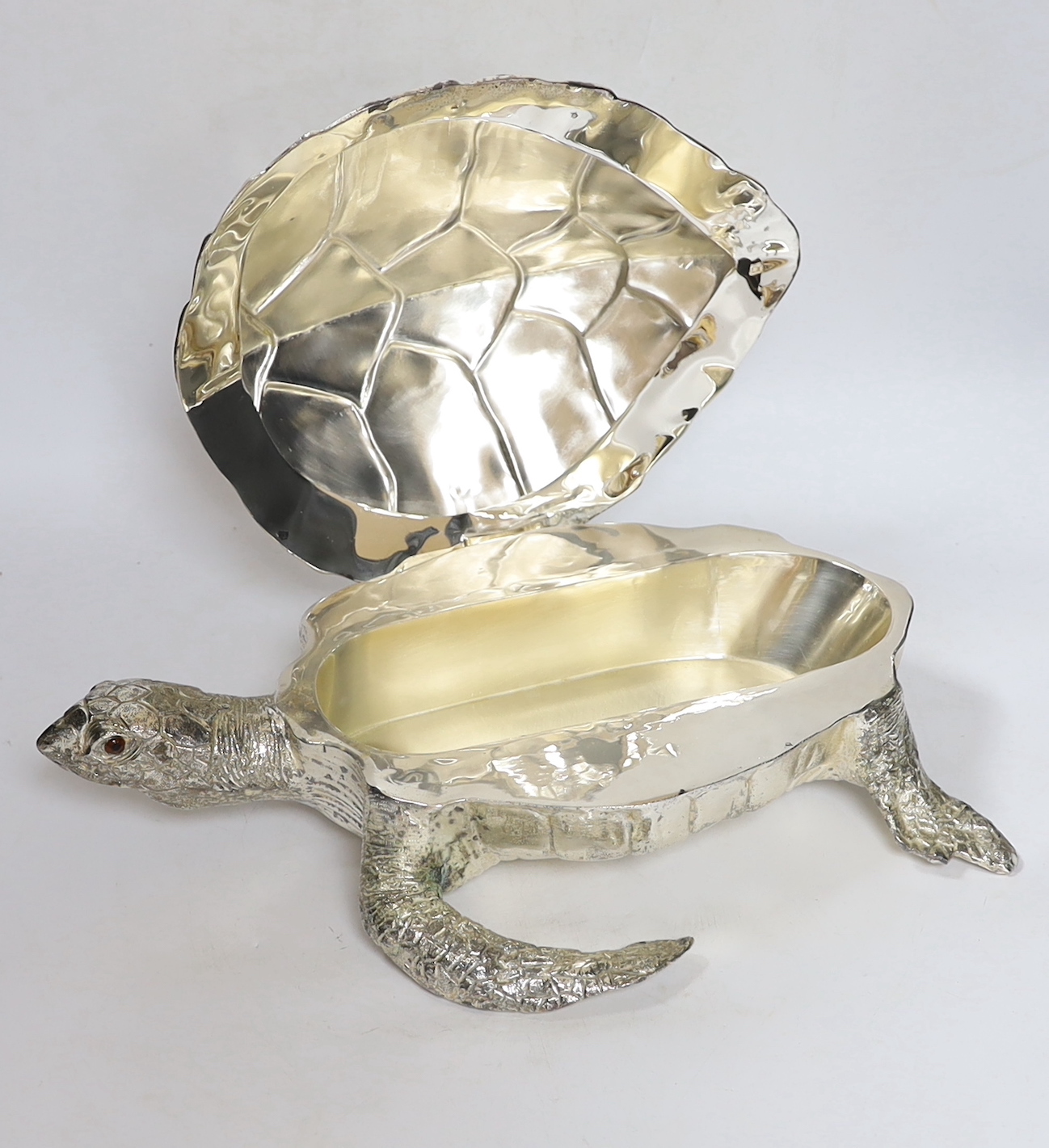 A silver plated turtle soup tureen with hinged lid, length 40cm